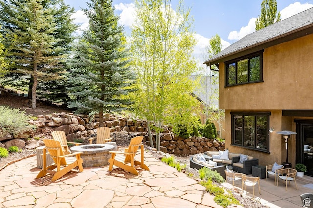 2938 Daybreaker Dr, Park City, UT 84098 - view of patio with an outdoor living space with a fire pit