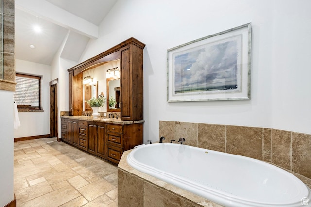 2938 Daybreaker Dr, Park City, UT 84098 - bathroom featuring double vanity, a garden tub, stone tile flooring, recessed lighting, and baseboards