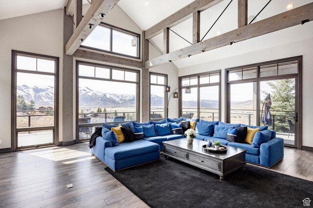 5925 Mountain Ranch Dr, Park City, UT 84098 - living room featuring a mountain view, high vaulted ceiling, hardwood / wood-style floors, beam ceiling, and baseboards