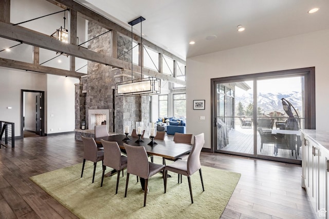 5925 Mountain Ranch Dr, Park City, UT 84098 - dining room featuring wood finished floors, high vaulted ceiling, baseboards, recessed lighting, and a chandelier