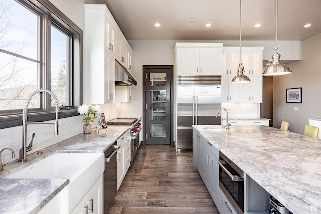5925 Mountain Ranch Dr, Park City, UT 84098 - kitchen with a sink, under cabinet range hood, recessed lighting, and decorative backsplash