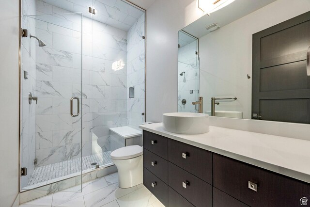 5925 Mountain Ranch Dr, Park City, UT 84098 - bathroom featuring marble finish floors, toilet, vanity, and a marble finish shower