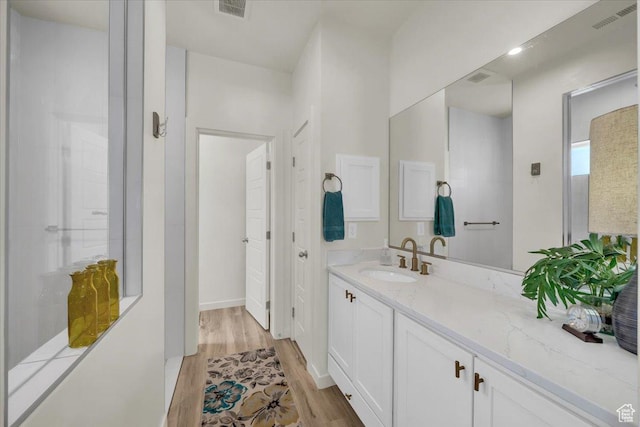 758 W Slate Ln, St George, UT 84790 - bathroom with wood finished floors and vanity