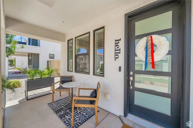 758 W Slate Ln, St George, UT 84790 - doorway to property featuring stucco siding and covered porch