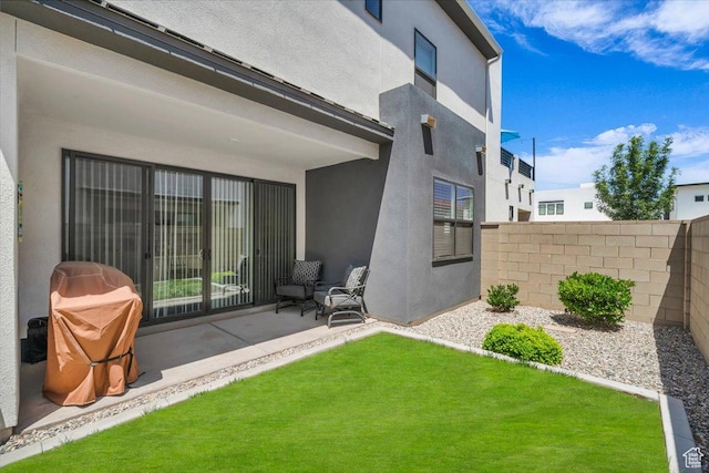 758 W Slate Ln, St George, UT 84790 - rear view of property featuring stucco siding and a patio