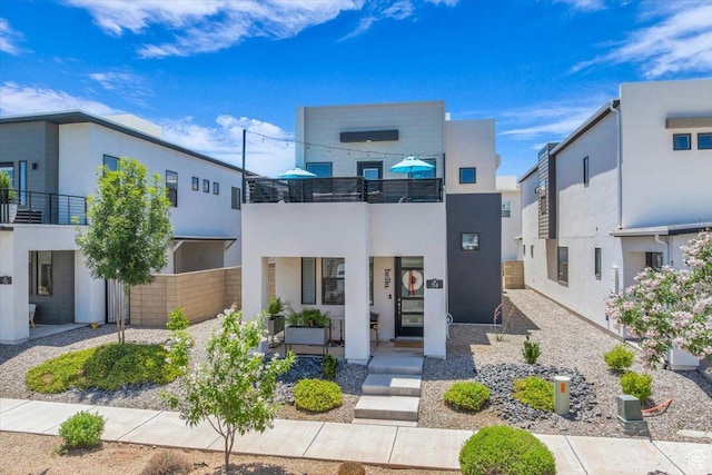 758 W Slate Ln, St George, UT 84790 - modern home with stucco siding and a balcony