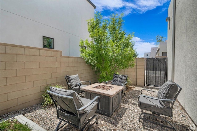 758 W Slate Ln, St George, UT 84790 - fenced backyard featuring an outdoor fire pit and a gate