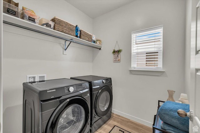 758 W Slate Ln, St George, UT 84790 - washroom featuring separate washer and dryer, light wood-type flooring, and baseboards
