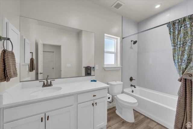 758 W Slate Ln, St George, UT 84790 - bathroom featuring toilet, vanity, shower / bath combo, and wood finished floors