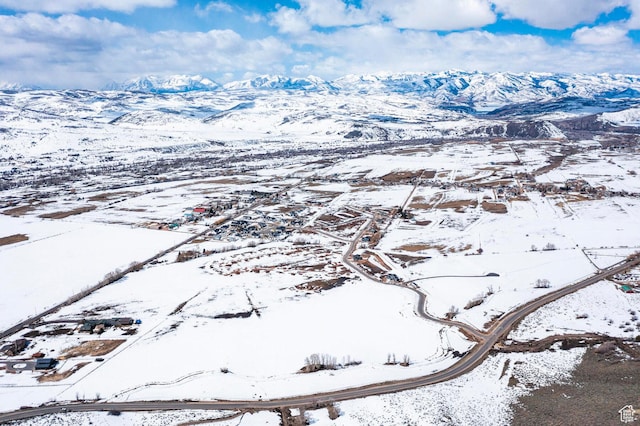 1460 Rocky Mountain Way Unit 223, Francis, UT 84036 - snowy aerial view featuring a mountain view