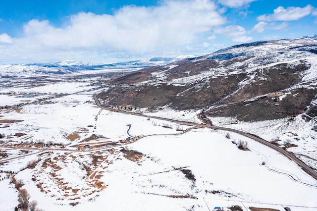1460 Rocky Mountain Way Unit 223, Francis, UT 84036 - snowy aerial view featuring a mountain view