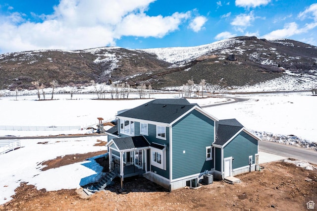 1460 Rocky Mountain Way Unit 223, Francis, UT 84036 - snowy aerial view with a mountain view