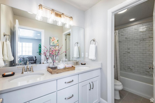 1460 Rocky Mountain Way Unit 223, Francis, UT 84036 - bathroom featuring double vanity, tile patterned floors, toilet, and shower / tub combo with curtain