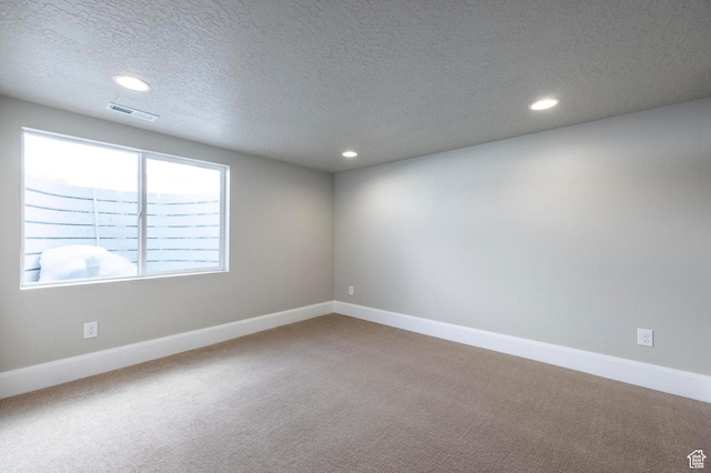 1460 Rocky Mountain Way Unit 223, Francis, UT 84036 - unfurnished room featuring recessed lighting, carpet flooring, a textured ceiling, and baseboards