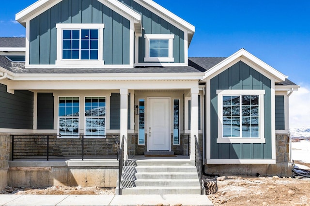 1460 Rocky Mountain Way Unit 223, Francis, UT 84036 - view of front of house featuring covered porch, a shingled roof, and board and batten siding