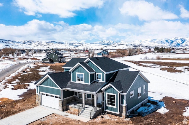 1460 Rocky Mountain Way Unit 223, Francis, UT 84036 - view of front of home with a porch, roof with shingles, concrete driveway, and board and batten siding