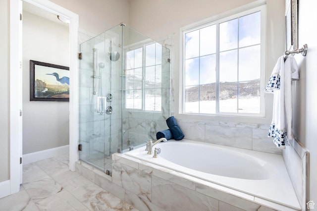 1460 Rocky Mountain Way Unit 223, Francis, UT 84036 - full bathroom featuring a bath, a shower stall, marble look tiles, and baseboards