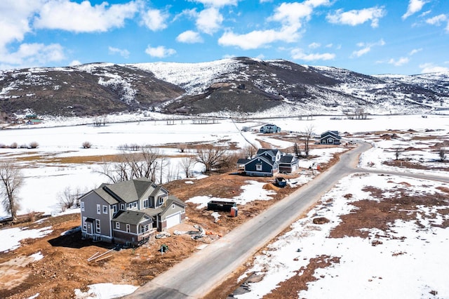 1460 Rocky Mountain Way Unit 223, Francis, UT 84036 - snowy aerial view featuring a mountain view