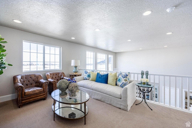 1460 Rocky Mountain Way Unit 223, Francis, UT 84036 - carpeted living room with recessed lighting, a textured ceiling, and baseboards
