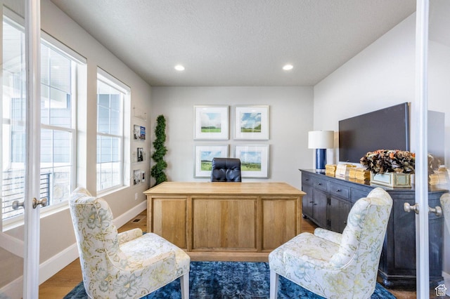 1460 Rocky Mountain Way Unit 223, Francis, UT 84036 - home office featuring baseboards, recessed lighting, wood finished floors, french doors, and a textured ceiling