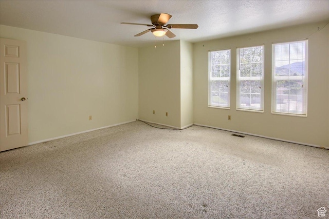 5725 S 1075 E, South Ogden, UT 84405 - carpeted spare room featuring a ceiling fan and baseboards