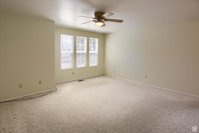 5725 S 1075 E, South Ogden, UT 84405 - unfurnished room featuring light colored carpet, a ceiling fan, and baseboards