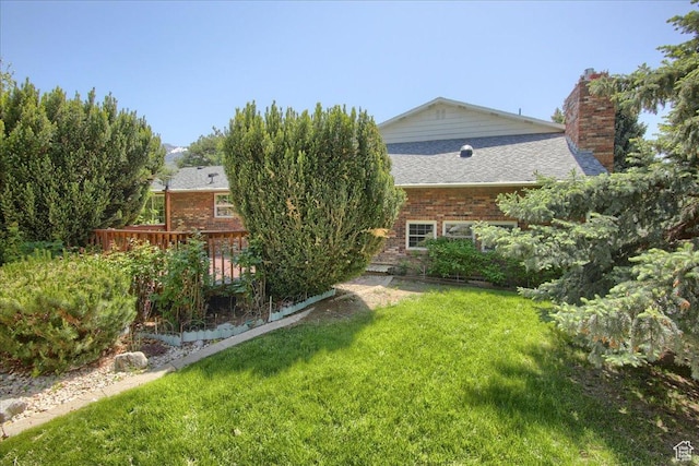 5725 S 1075 E, South Ogden, UT 84405 - view of grassy yard featuring a wooden deck