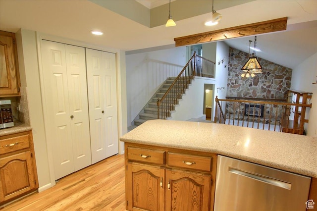 5725 S 1075 E, South Ogden, UT 84405 - kitchen with stainless steel appliances, light wood-type flooring, lofted ceiling, pendant lighting, and light countertops