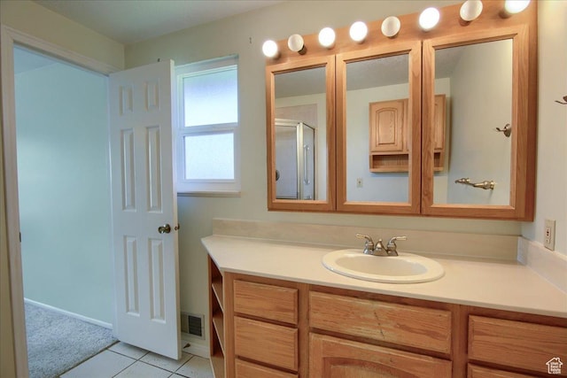5725 S 1075 E, South Ogden, UT 84405 - bathroom with vanity, an enclosed shower, and tile patterned floors