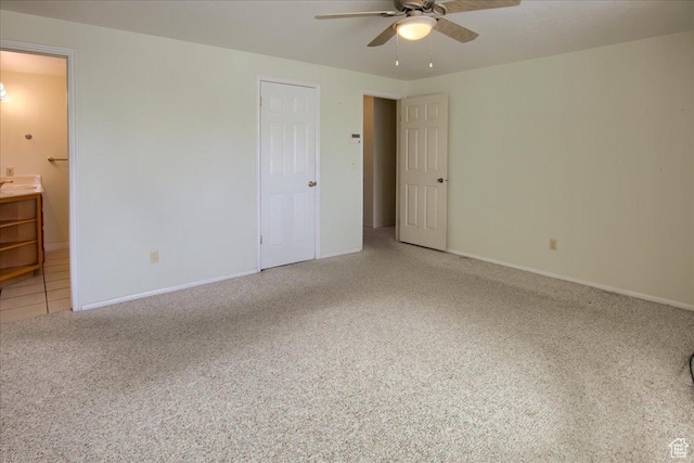 5725 S 1075 E, South Ogden, UT 84405 - unfurnished bedroom featuring light colored carpet, ensuite bathroom, baseboards, and ceiling fan