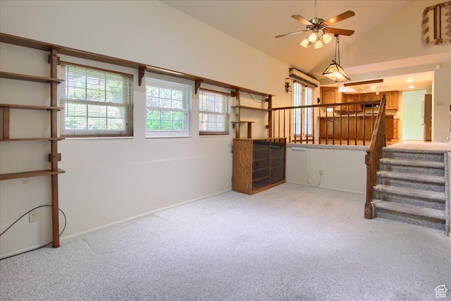 5725 S 1075 E, South Ogden, UT 84405 - unfurnished living room featuring carpet, ceiling fan, stairway, vaulted ceiling, and baseboards