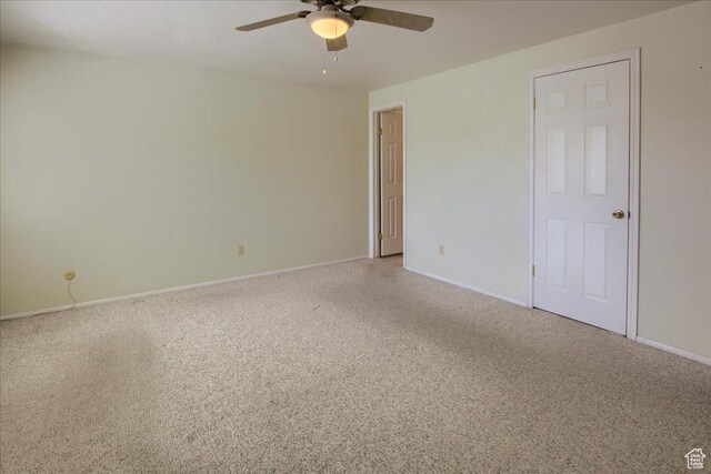 5725 S 1075 E, South Ogden, UT 84405 - carpeted spare room featuring a ceiling fan and baseboards