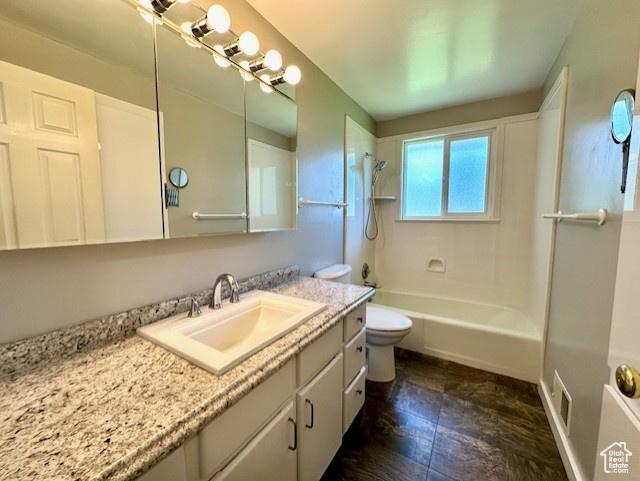 558 E Center St, Kaysville, UT 84037 - full bathroom with toilet, vanity, and shower / tub combination