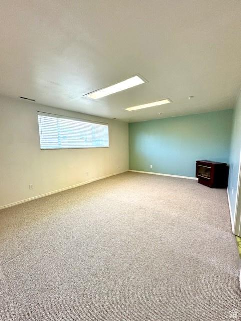 558 E Center St, Kaysville, UT 84037 - carpeted empty room featuring baseboards