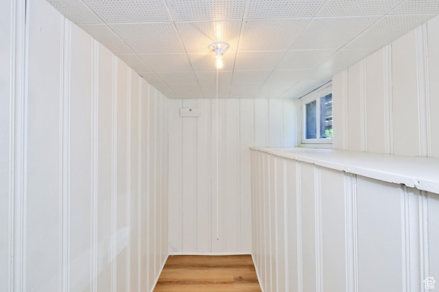 557 E Cleveland Ave, Salt Lake City, UT 84105 - basement with a decorative wall and light wood finished floors
