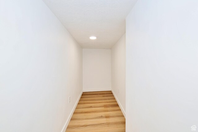 557 E Cleveland Ave, Salt Lake City, UT 84105 - corridor with light wood-type flooring and baseboards