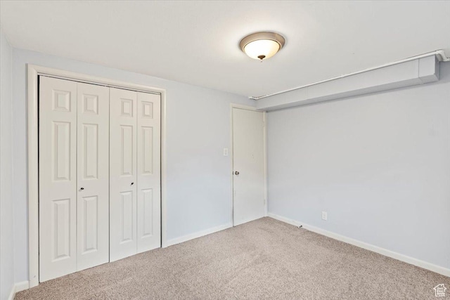 5824 S 2150 W, Roy, UT 84067 - unfurnished bedroom featuring carpet flooring, baseboards, and a closet