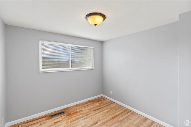 5824 S 2150 W, Roy, UT 84067 - unfurnished room featuring baseboards and wood finished floors