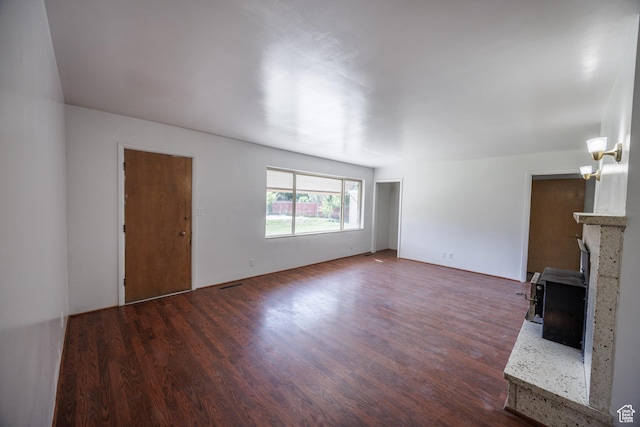 253 S 100 W, American Fork, UT 84003 - unfurnished living room featuring dark wood-type flooring