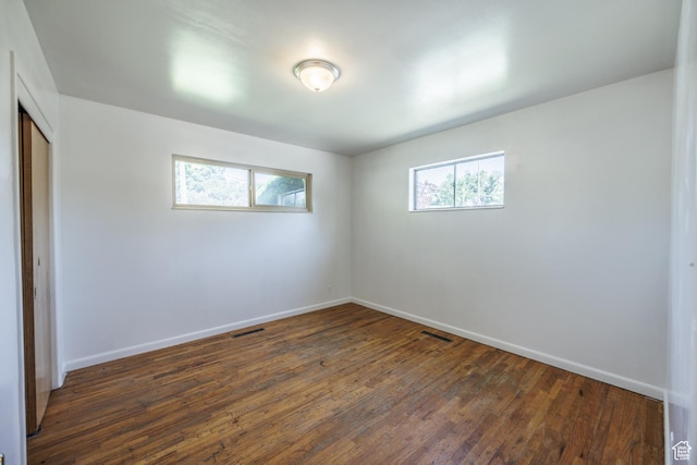 253 S 100 W, American Fork, UT 84003 - unfurnished room with healthy amount of natural light, dark wood-type flooring, and baseboards