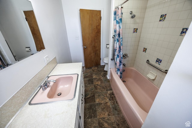 253 S 100 W, American Fork, UT 84003 - bathroom featuring toilet, stone finish flooring, vanity, and shower / tub combo with curtain