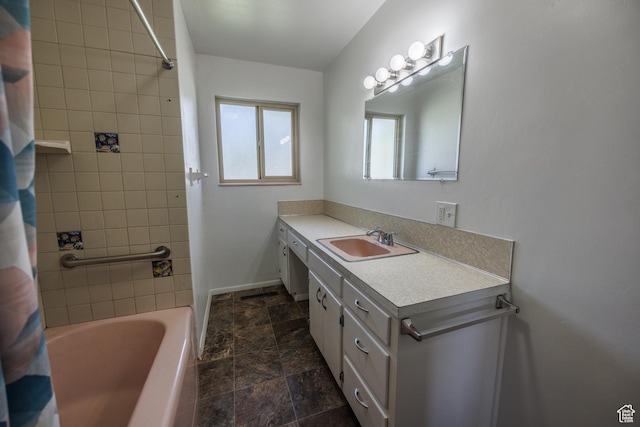 253 S 100 W, American Fork, UT 84003 - full bath with vanity, stone finish floors, shower / bath combo with shower curtain, and baseboards