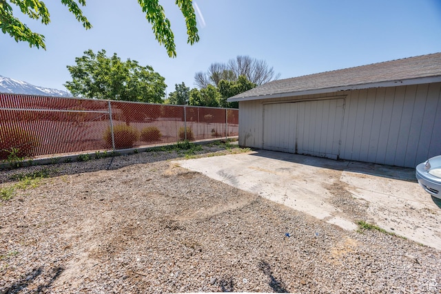 253 S 100 W, American Fork, UT 84003 - view of yard with a detached garage and an outdoor structure