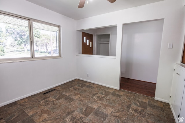 253 S 100 W, American Fork, UT 84003 - spare room with stone finish floors, baseboards, and ceiling fan