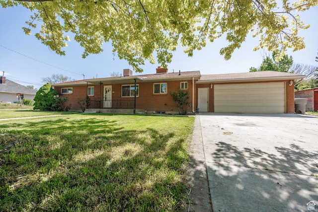 253 S 100 W, American Fork, UT 84003 - ranch-style home with brick siding, an attached garage, a front yard, driveway, and a chimney