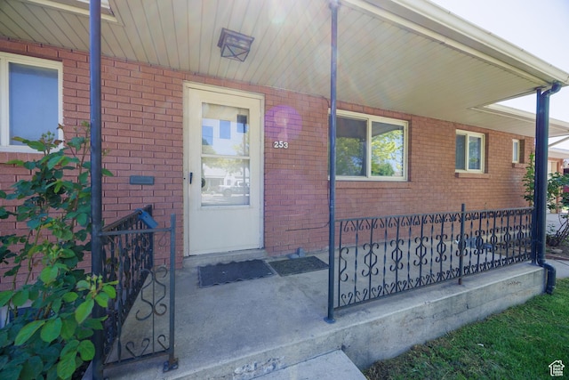 253 S 100 W, American Fork, UT 84003 - property entrance with a porch and brick siding