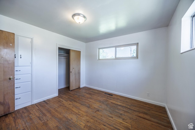253 S 100 W, American Fork, UT 84003 - unfurnished bedroom with baseboards, dark wood-style flooring, and a closet