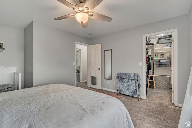 1874 W 180 S, Orem, UT 84059 - bedroom with a walk in closet, carpet, a closet, baseboards, and a ceiling fan