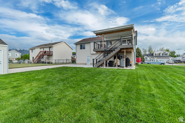 1874 W 180 S, Orem, UT 84059 - rear view of house with stairway, a residential view, a patio area, and a wooden deck