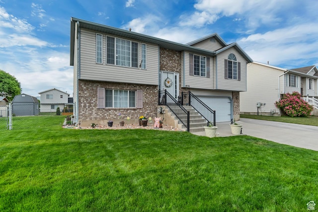 1874 W 180 S, Orem, UT 84059 - split foyer home with driveway, brick siding, and a garage